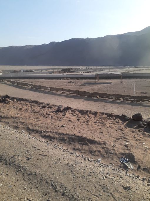 Venta de excelente sitio eriazo, en Quebrada de Acha, Quinto Sector, con frente hacia carretera Panamericana Sur.
